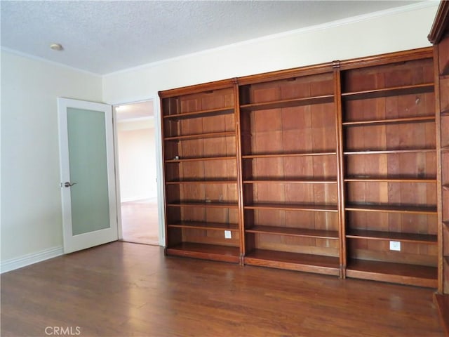 22727 Mariano St, Woodland Hills, CA 91367 - unfurnished bedroom featuring wood finished floors, crown molding, and a textured ceiling