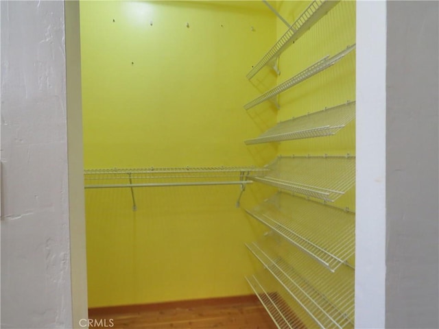 22727 Mariano St, Woodland Hills, CA 91367 - spacious closet with wood finished floors