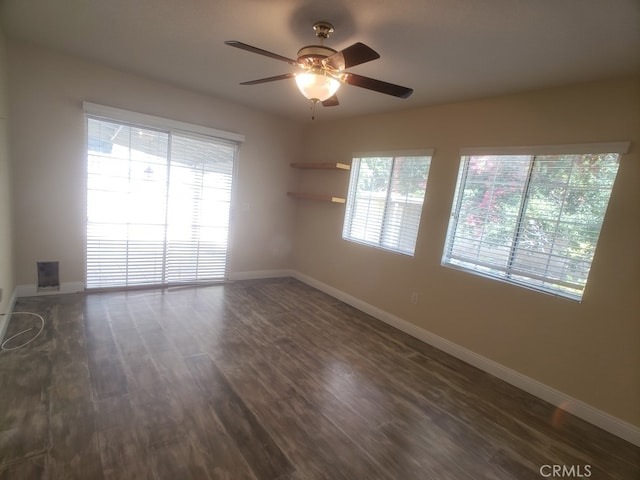 22727 Mariano St, Woodland Hills, CA 91367 - unfurnished room featuring ceiling fan and dark wood-style floors