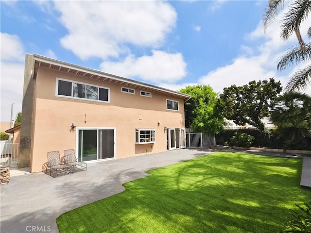 15202 Marne Cir, Irvine, CA 92604 - rear view of house featuring stucco siding and a patio area