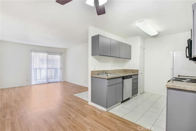 1265 Kendall Dr Unit 222, San Bernardino, CA 92407 - kitchen featuring stainless steel dishwasher, gray cabinetry, ceiling fan, and light countertops