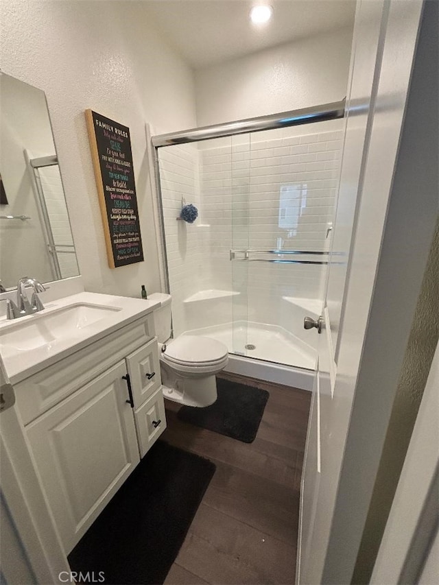 2717 Juniper Berry St, Spring Valley, CA 91977 - bathroom featuring wood finished floors, a shower stall, vanity, recessed lighting, and a textured wall