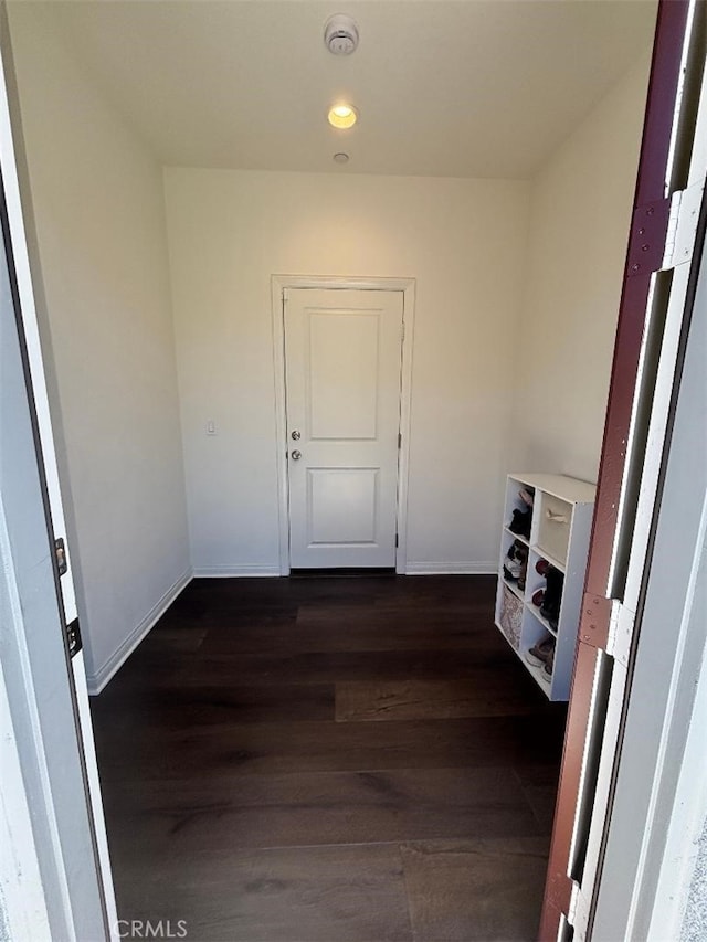 2717 Juniper Berry St, Spring Valley, CA 91977 - corridor featuring dark wood-style flooring and baseboards