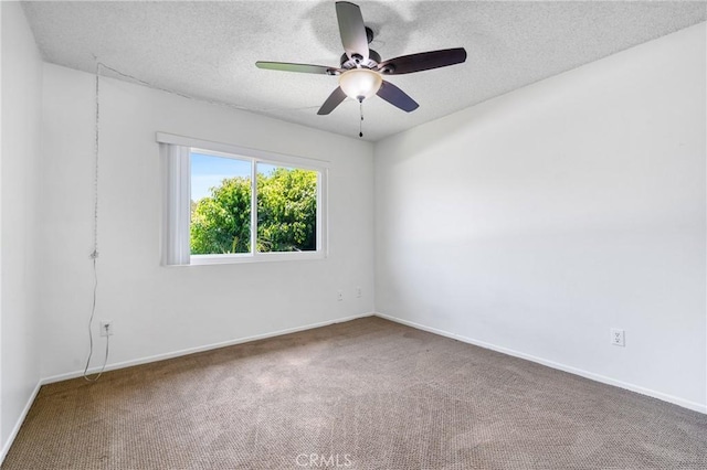 2231 Pacific Ave Unit 14, Costa Mesa, CA 92627 - carpeted empty room featuring a ceiling fan and a textured ceiling