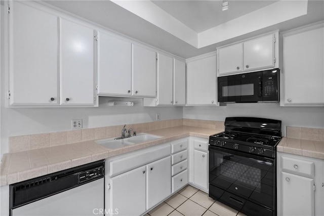 2231 Pacific Ave Unit 14, Costa Mesa, CA 92627 - kitchen featuring black appliances and white cabinetry
