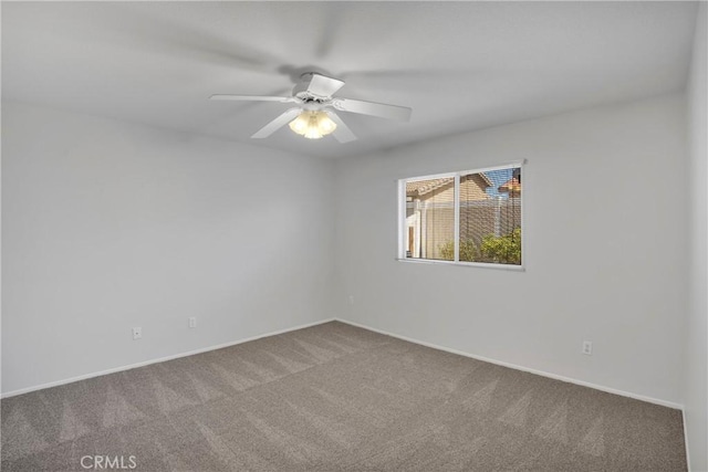 14183 Gale Dr, Victorville, CA 92394 - empty room featuring carpet flooring and ceiling fan