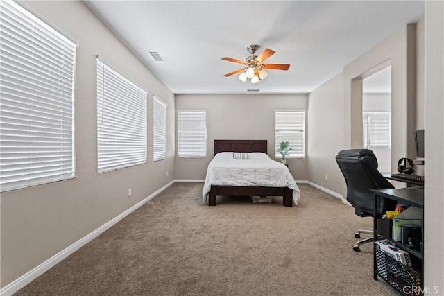 3020 Peaceful Way, Lancaster, CA 93535 - carpeted bedroom with a desk and a ceiling fan