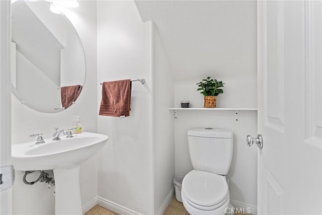 3020 Peaceful Way, Lancaster, CA 93535 - bathroom featuring toilet and baseboards