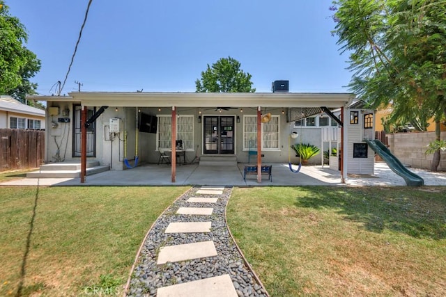10923 Haskell Ave, Granada Hills, CA 91344 - back of house featuring french doors, a playground, ceiling fan, and a patio area
