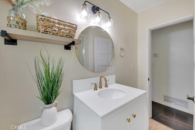 10923 Haskell Ave, Granada Hills, CA 91344 - bathroom with vanity and wood finished floors