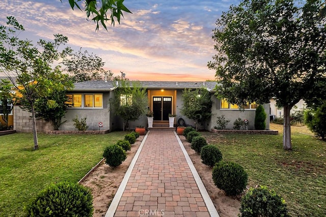 10923 Haskell Ave, Granada Hills, CA 91344 - single story home with stucco siding and a front yard