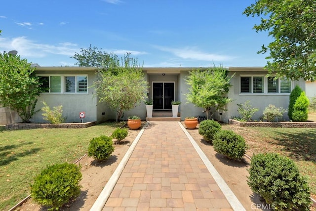 10923 Haskell Ave, Granada Hills, CA 91344 - ranch-style home with stucco siding and a front yard