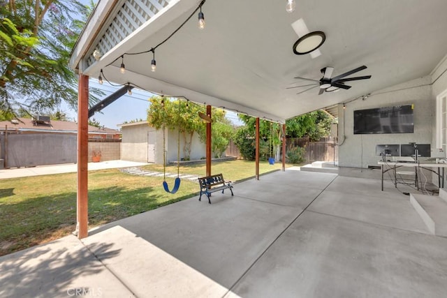 10923 Haskell Ave, Granada Hills, CA 91344 - fenced backyard with ceiling fan and a patio area