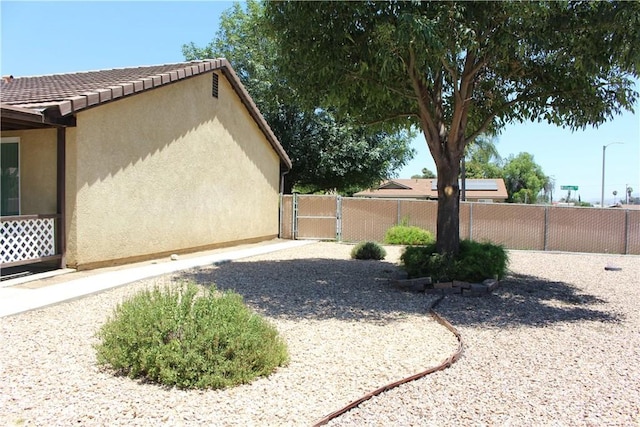 10768 William Ave, Bloomington, CA 92316 - view of yard with a gate