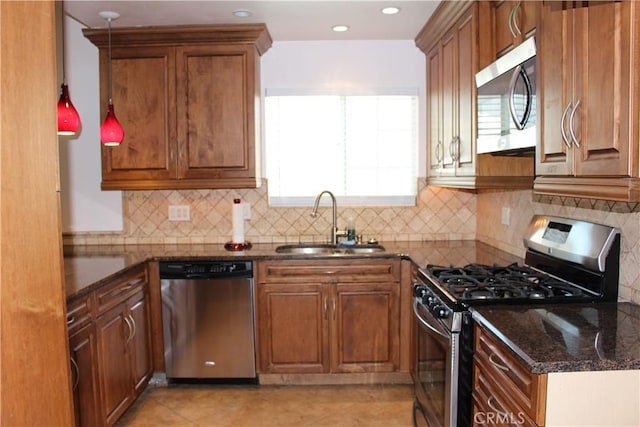 10768 William Ave, Bloomington, CA 92316 - kitchen featuring appliances with stainless steel finishes, brown cabinetry, tasteful backsplash, and recessed lighting