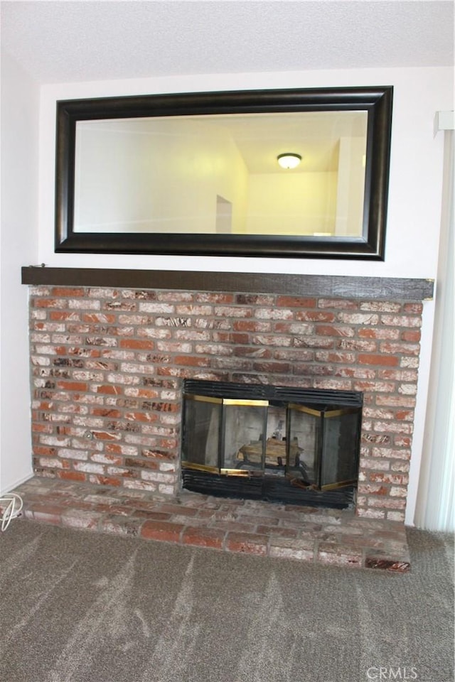 10768 William Ave, Bloomington, CA 92316 - detailed view of a brick fireplace and carpet flooring