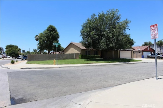 10768 William Ave, Bloomington, CA 92316 - view of asphalt street featuring sidewalks and curbs