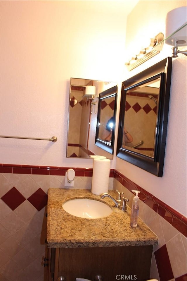10768 William Ave, Bloomington, CA 92316 - bathroom with tile walls, vanity, and wainscoting