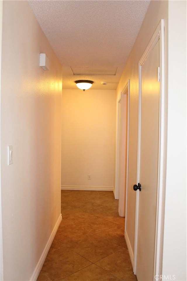 10768 William Ave, Bloomington, CA 92316 - hall featuring a textured ceiling