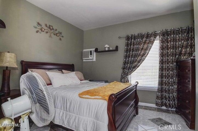 373 Rainbow Ter, Palmdale, CA 93551 - bedroom with a wall mounted air conditioner and light tile patterned floors