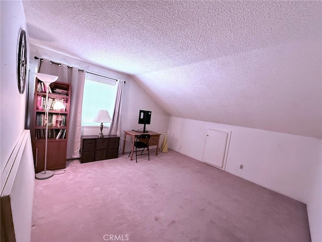 12314 Edgefield St, Cerritos, CA 90703 - bonus room with a textured ceiling, lofted ceiling, and carpet floors