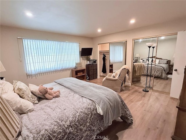 12314 Edgefield St, Cerritos, CA 90703 - bedroom with two closets, light wood finished floors, and recessed lighting