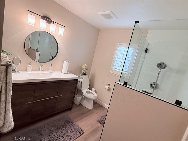12314 Edgefield St, Cerritos, CA 90703 - bathroom featuring wood finished floors, walk in shower, and vanity