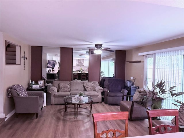 12314 Edgefield St, Cerritos, CA 90703 - living room featuring a ceiling fan and light wood-style floors