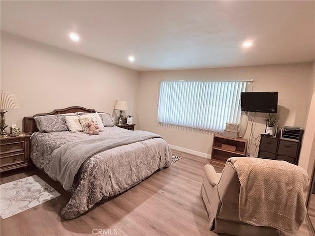12314 Edgefield St, Cerritos, CA 90703 - bedroom with wood finished floors and recessed lighting