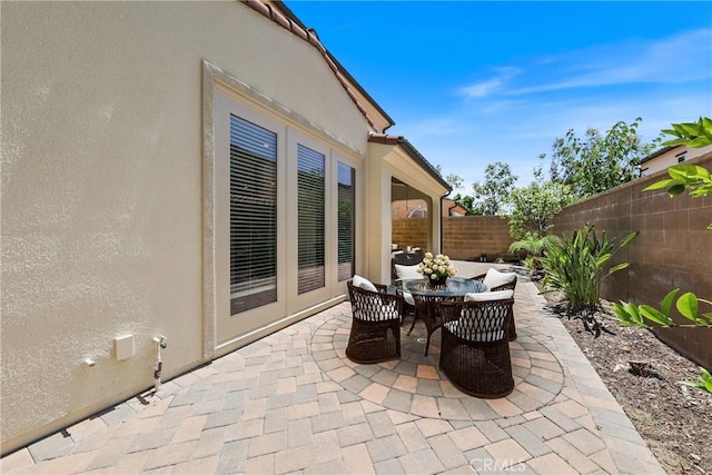 41 Somerton, Irvine, CA 92620 - fenced backyard with a patio area, french doors, and outdoor dining space