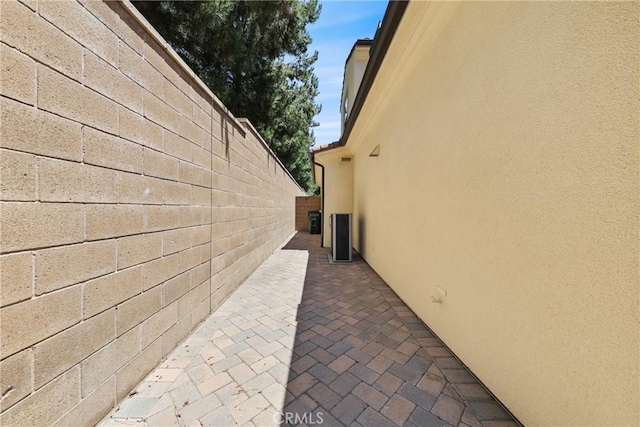 41 Somerton, Irvine, CA 92620 - view of property exterior with stucco siding and a patio area