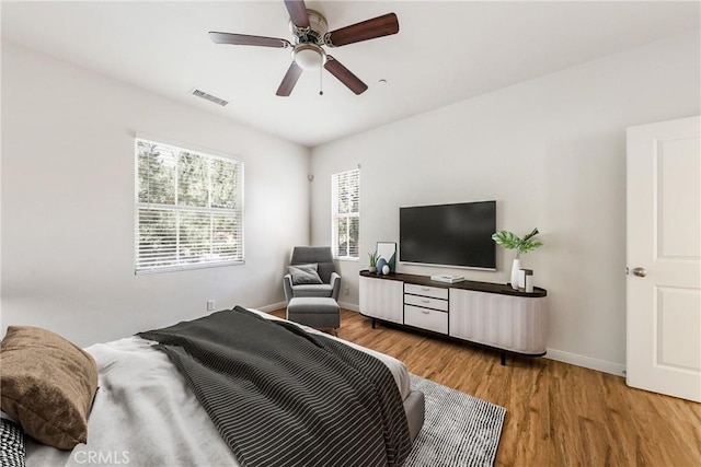 41 Somerton, Irvine, CA 92620 - bedroom with light wood-type flooring and ceiling fan