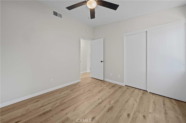 43906 Broadwater Ave, Lancaster, CA 93535 - unfurnished bedroom with wood finished floors, a ceiling fan, and a closet
