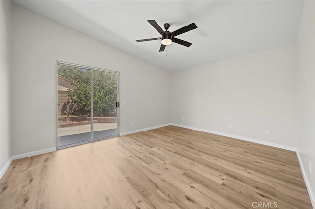 43906 Broadwater Ave, Lancaster, CA 93535 - empty room featuring vaulted ceiling, wood finished floors, and a ceiling fan