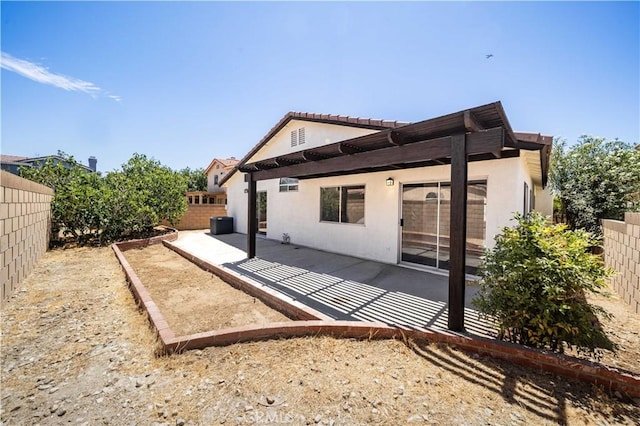 43906 Broadwater Ave, Lancaster, CA 93535 - rear view of house featuring stucco siding, a patio area, and a fenced backyard