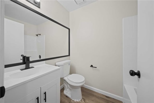 43906 Broadwater Ave, Lancaster, CA 93535 - full bathroom with wood finished floors, vanity, and washtub / shower combination