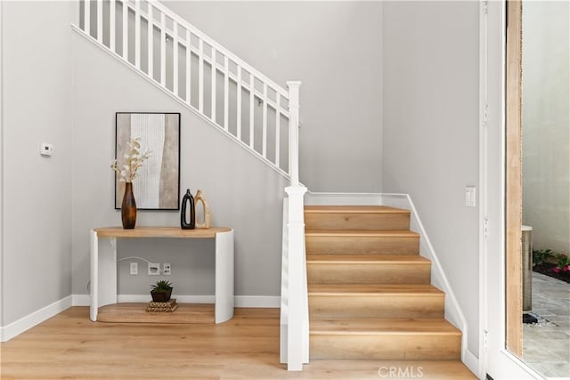22 Lomada St, Rancho Mission Viejo, CA 92694 - staircase with wood finished floors and baseboards