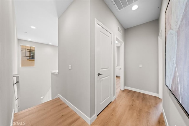 22 Lomada St, Rancho Mission Viejo, CA 92694 - hallway with an upstairs landing, light wood-style flooring, and recessed lighting