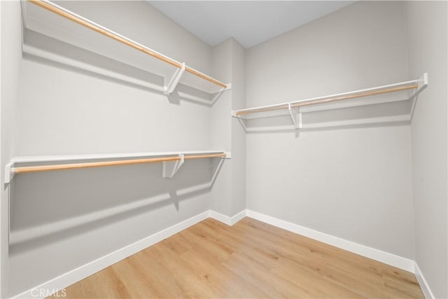 22 Lomada St, Rancho Mission Viejo, CA 92694 - walk in closet with wood finished floors