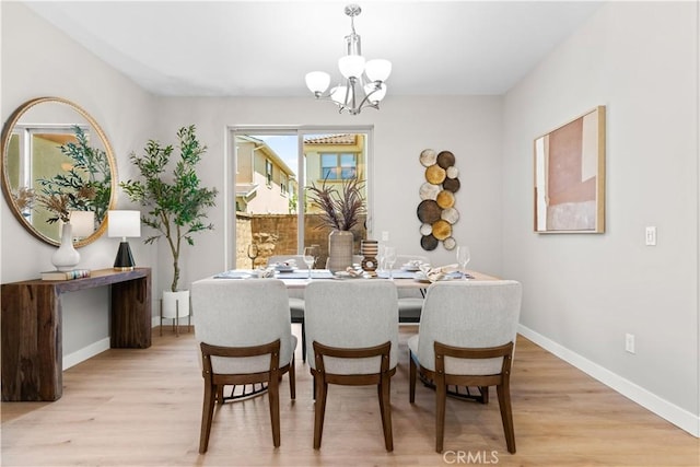 22 Lomada St, Rancho Mission Viejo, CA 92694 - dining area with a chandelier and light wood-type flooring