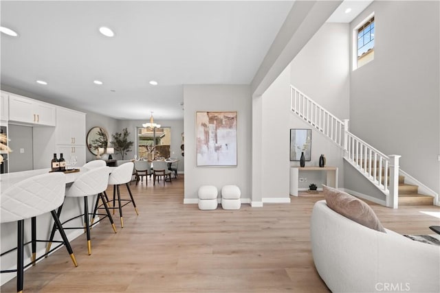 22 Lomada St, Rancho Mission Viejo, CA 92694 - living room featuring stairway, recessed lighting, and light wood-style flooring