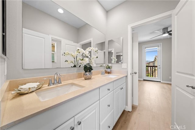 22 Lomada St, Rancho Mission Viejo, CA 92694 - full bathroom with double vanity, wood finished floors, and ceiling fan