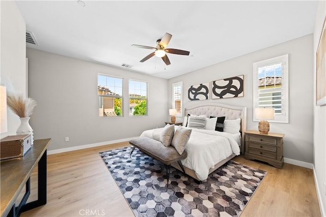 22 Lomada St, Rancho Mission Viejo, CA 92694 - bedroom featuring multiple windows, light wood-style flooring, and ceiling fan