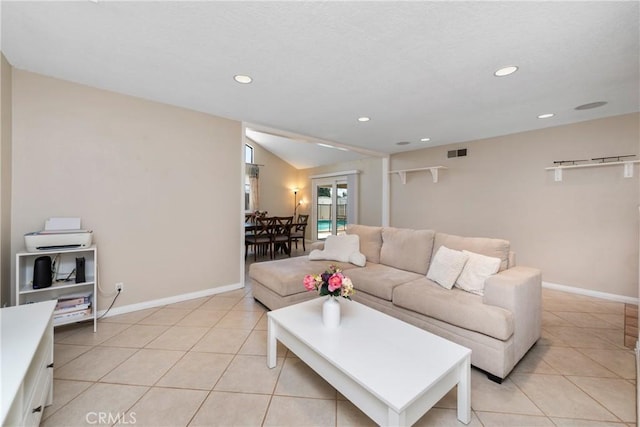 1524 Casarin Ave, Simi Valley, CA 93065 - living area featuring light tile patterned flooring, recessed lighting, and lofted ceiling