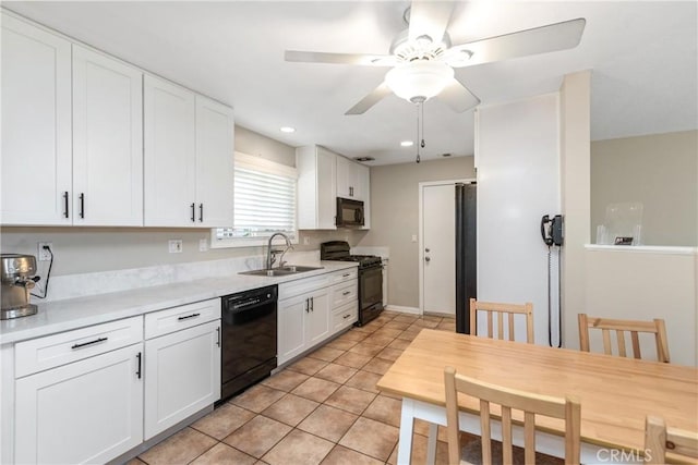 1524 Casarin Ave, Simi Valley, CA 93065 - kitchen with black appliances, white cabinetry, light countertops, a ceiling fan, and light tile patterned floors