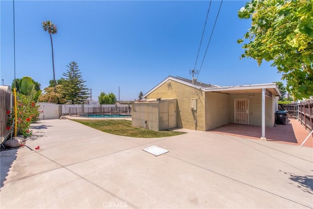 1524 Casarin Ave, Simi Valley, CA 93065 - rear view of house featuring stucco siding, a patio, and a fenced backyard