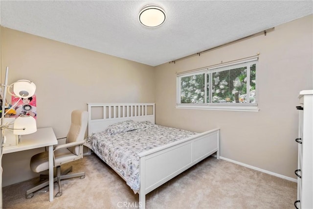 1524 Casarin Ave, Simi Valley, CA 93065 - bedroom with light carpet, a textured ceiling, and an office area