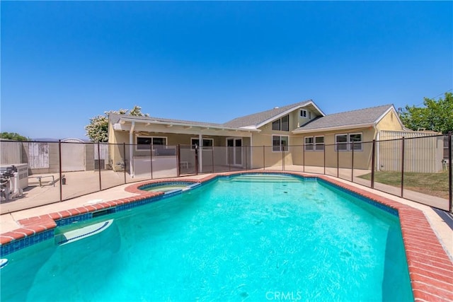 1524 Casarin Ave, Simi Valley, CA 93065 - view of swimming pool with a patio and a pool with connected hot tub