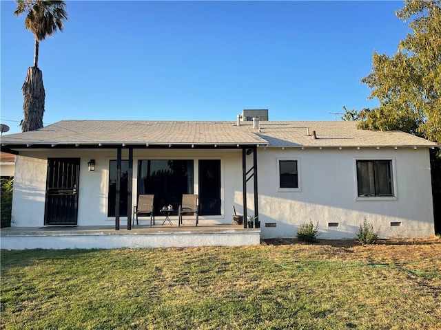 537 Drakeley Ave, Atwater, CA 95301 - rear view of property with crawl space, a lawn, and stucco siding