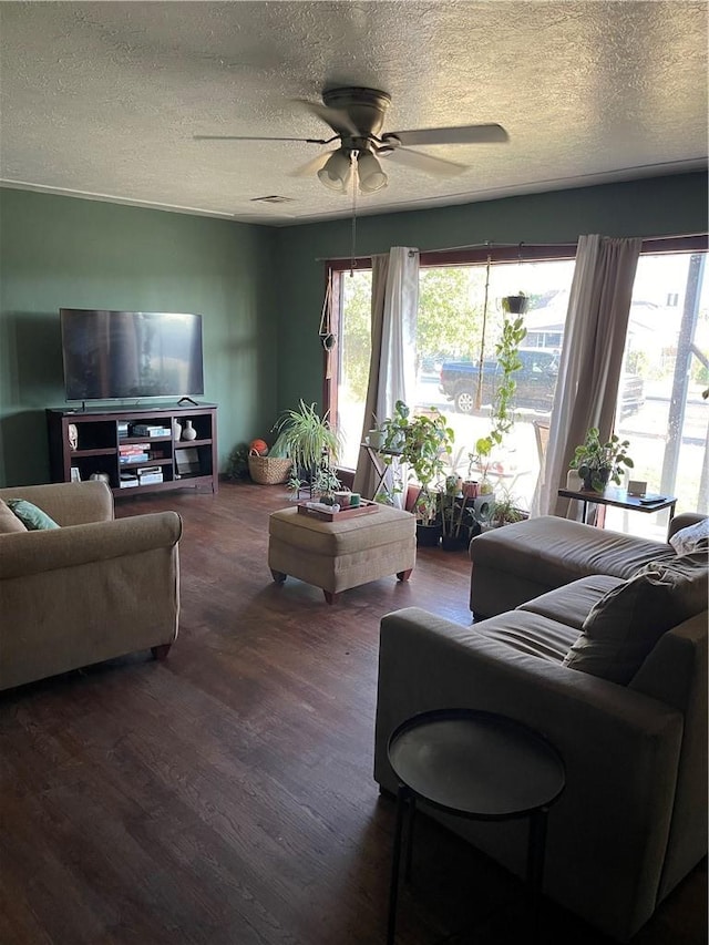 537 Drakeley Ave, Atwater, CA 95301 - living room featuring ceiling fan, wood finished floors, and a textured ceiling